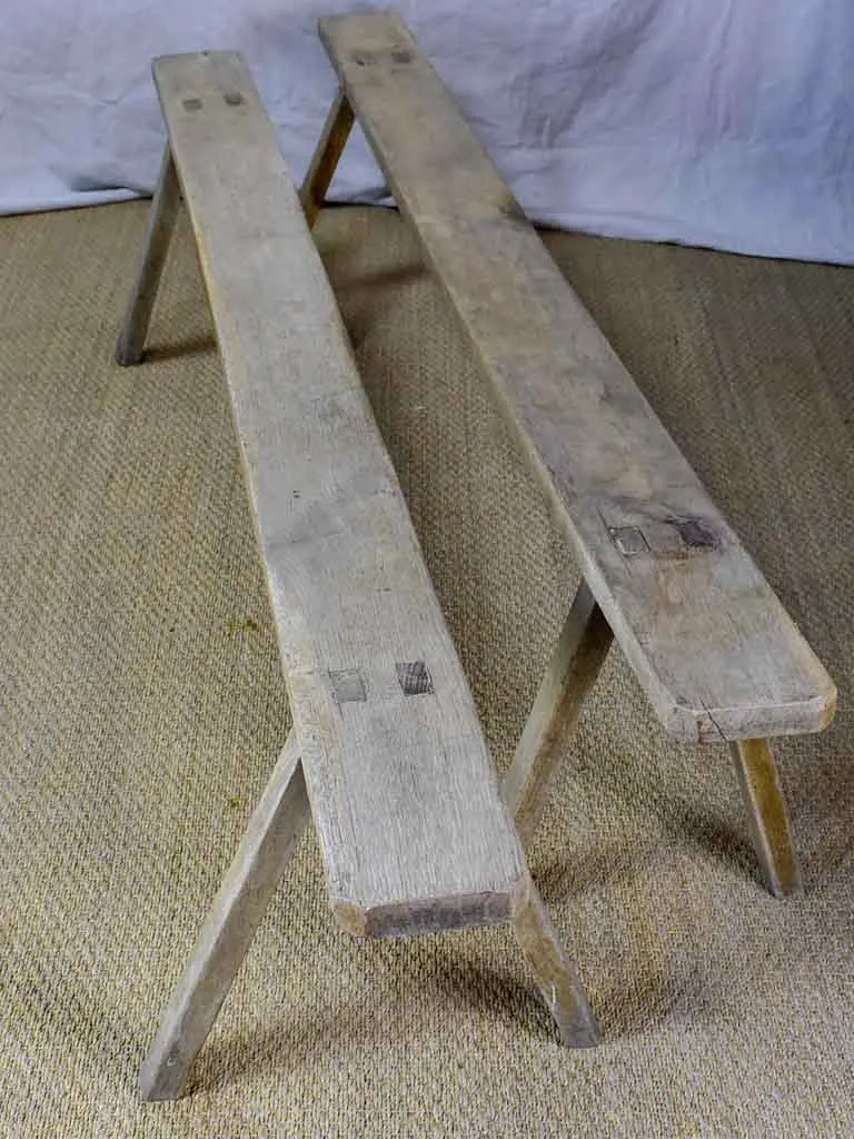 Pair of rustic antique French benches with splayed feet